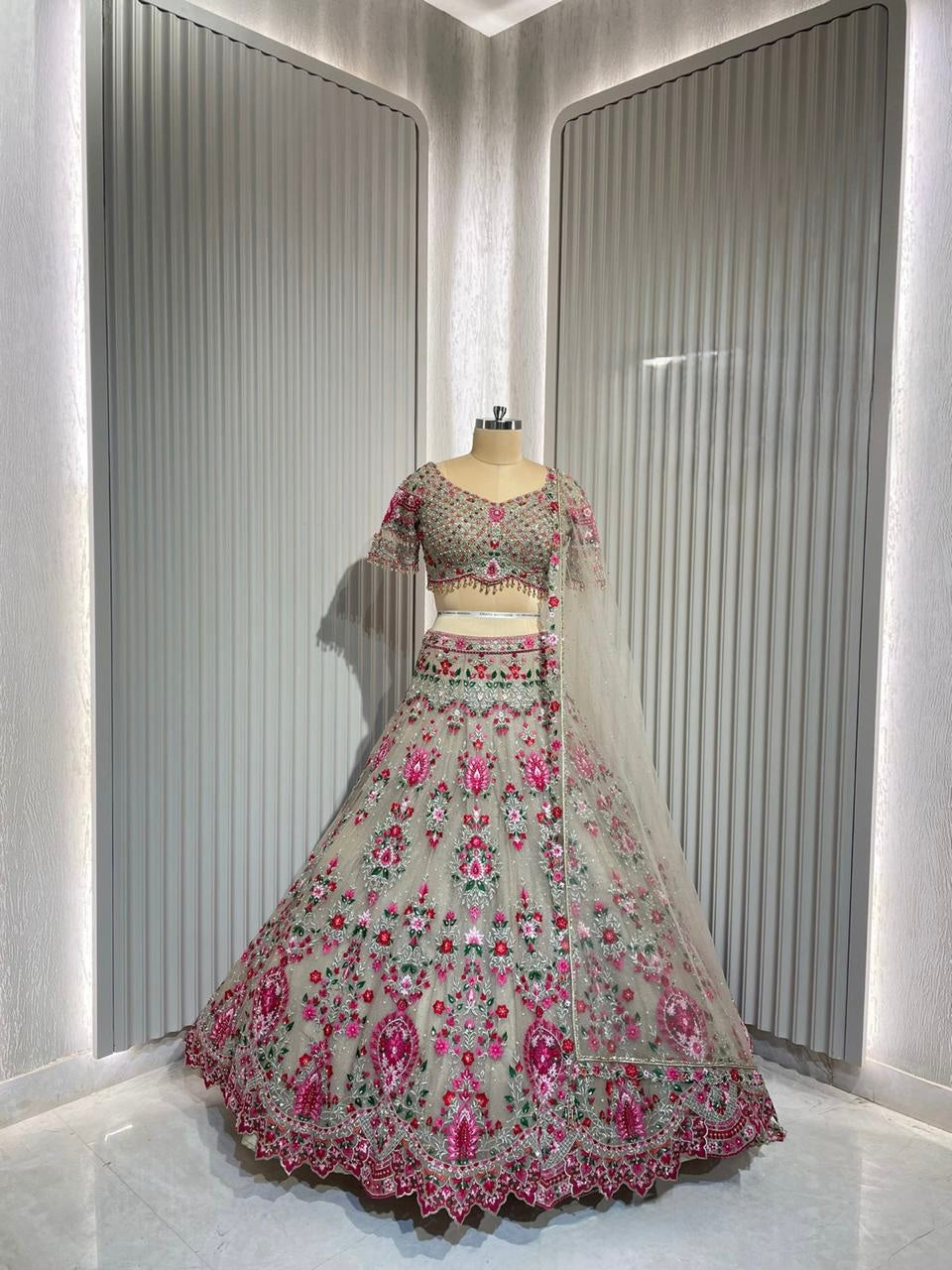 Sand beige & rose pink floral Lehnga with total hand work blouse & complete zirconia & mirror embellishments on all over Lehnga